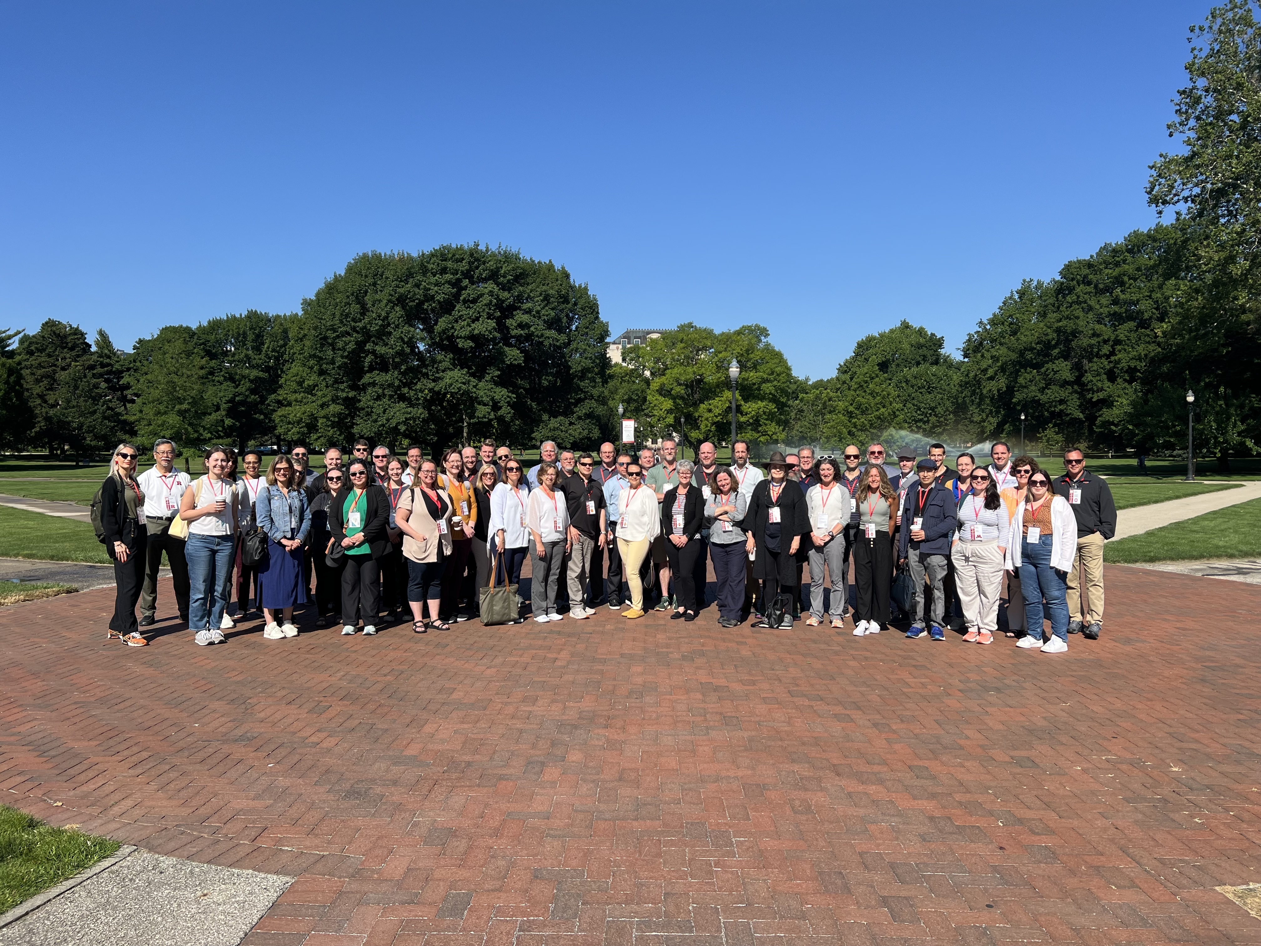 The HEFMA group smiling for a photo while standing outside in The Oval.