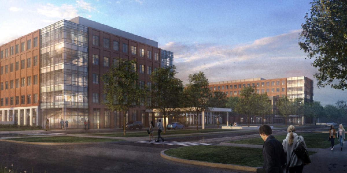 rendering of the hamilton road ambulatory facility showing a 5-story brick building at dusk