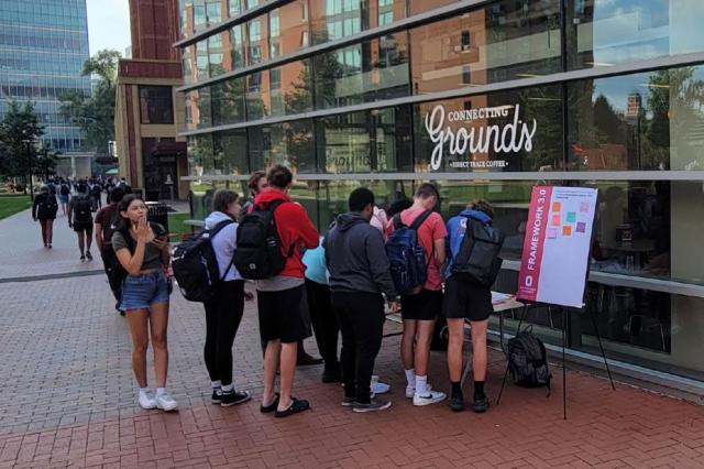 students providing feedback on sign boards